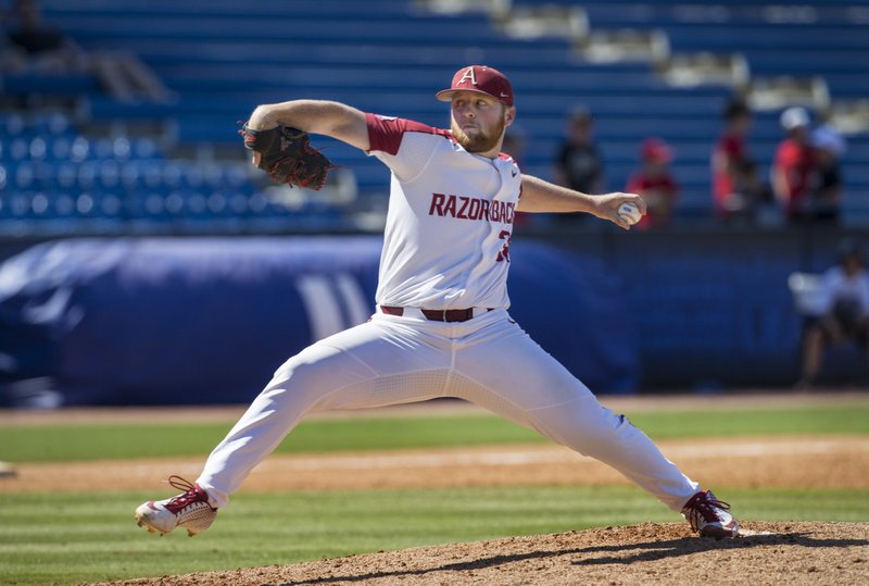 NWA Democrat-Gazette/Ben Goff FOLLOWING THROUGH: Arkansas closer Matt Cronin pitches in the 9th inning Wednesday against Ole Miss during the Southeastern Conference Tournament at the Hoover Metropolitan Stadium in Hoover, Ala.
