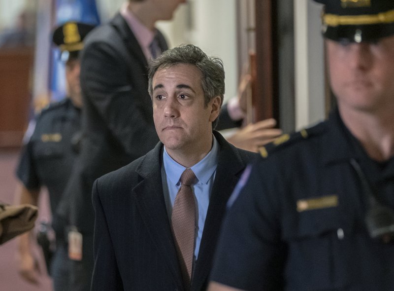 In this March 6, 2019 photo, Michael Cohen, President Donald Trump's former personal lawyer departs the Capitol in Washington.  (AP Photo/J. Scott Applewhite, File)