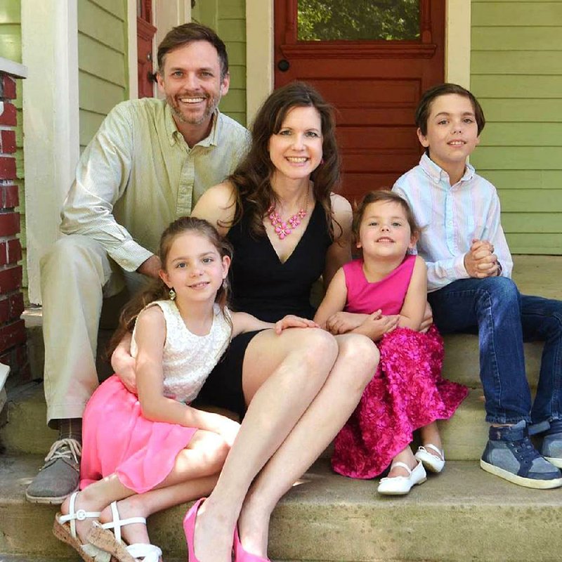 Spencer Sutterfield and April Gentry-Sutterfield will celebrate their 17th anniversary this week. They have three children, Blythe, 7, Hollis, 4, and Clem, 10. The fi rst time Spencer saw April was when she was on stage in the Morrilton High School production of Oliver! “It’s kind of a part of the magic of the story,” he says. “I was captivated.” 