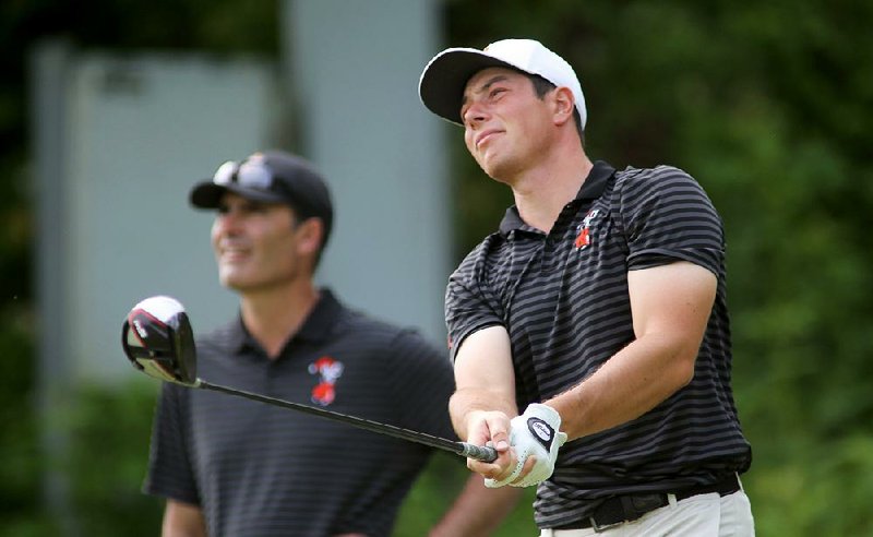 Oklahoma State’s Viktor Hovland follows his tee shot on the second hole during the practice round Thursday at the Blessings Golf Club in Fayetteville.