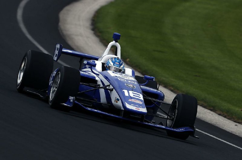 Jarett Andretti drives Monday at Indianapolis Motor Speedway during practice for today’s Freedom 100 Indy Lights race. Andretti, 26, will become the seventh member of his family to race at Indy.