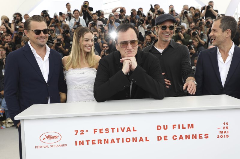Actors Leonardo DiCaprio, from left, Margot Robbie, director Quentin Tarantino, actor Brad Pitt and producer David Heyman pose for photographers at the photo call for the film 'Once Upon a Time in Hollywood' at the 72nd international film festival, Cannes, southern France, Wednesday, May 22, 2019. (Photo by Vianney Le Caer/Invision/AP)