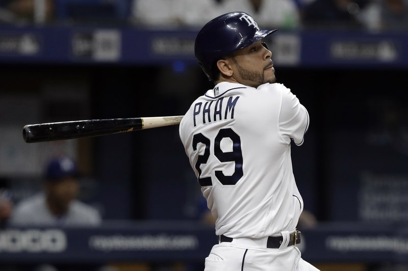 The Associated Press BIG HIT: Tampa Bay Rays' Tommy Pham follows through on a solo home run off Los Angeles Dodgers starting pitcher Rich Hill during the fourth inning of Wednesday's game in St. Petersburg, Fla.
