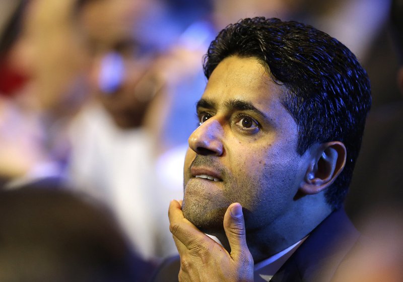 FILE - In this Aug. 25, 2016 file photo, President of Paris Saint-Germain soccer club, Nasser Al-Khelaifi, gestures during the UEFA Champions League draw at the Grimaldi Forum, in Monaco. A French judicial official says the president of Paris Saint-Germain has been placed under investigation for suspected corruption. (AP Photo/Claude Paris, File)