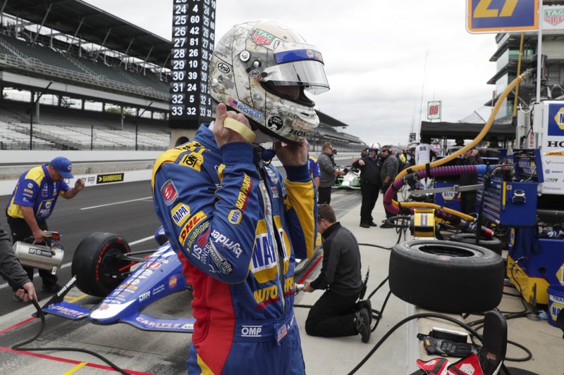 Alexander Rossi prepares to drive before the start of practice for the Indianapolis 500 IndyCar auto race at Indianapolis Motor Speedway, Monday, May 20, 2019, in Indianapolis. (AP Photo/Michael Conroy)