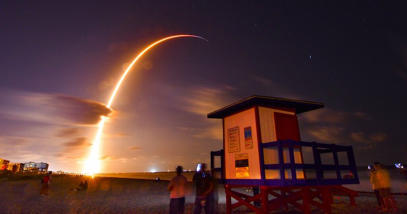 A Falcon 9 SpaceX rocket with a payload of 60 satellites for SpaceX's Starlink broadband network, lifts off from Space Launch Complex 40 at Florida's Cape Canaveral Air Force Station, Thursday, May 23, 2019. A 149 second time exposure of the launch Thursday night is viewed from the end of Minutemen Causeway in Cocoa Beach, Fla. (Malcolm Denemark/Florida Today via AP)