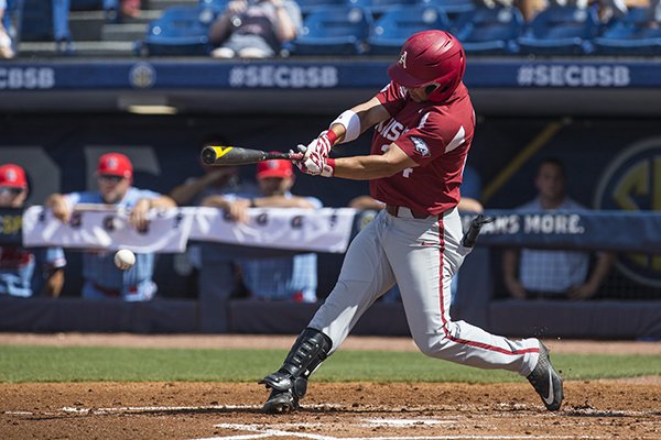 Arkansas center fielder Dominic Fletcher swings at a pitch during an SEC Tournament game against Ole Miss on Friday, May 24, 2019, in Fayetteville. 