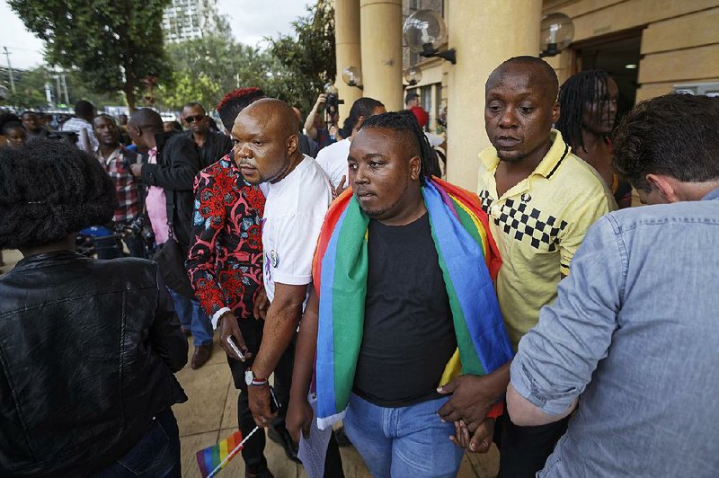 Disappointed activists leave after Friday’s High Court ruling in Nairobi, Kenya, on laws criminalizing gay relations. The activists vowed to appeal. 