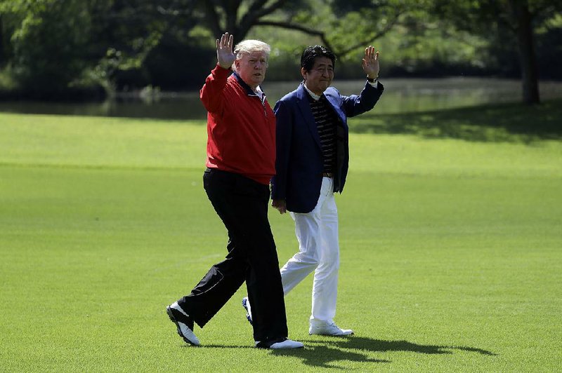 President Donald Trump and Japanese Prime Minister Shinzo Abe head for a round of golf today at Mobara Country Club south of Tokyo. Later, they were to sit ringside at a sumo wrestling match. 