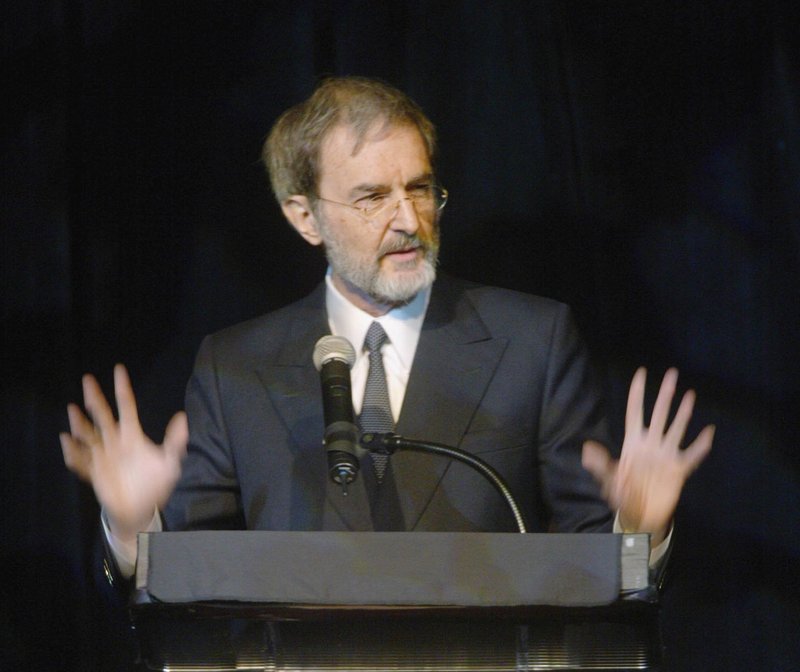 FILE - In a Feb. 5, 2003 file photo, Pulitzer Prize winner and keynote speaker Edmund Morris speaks, during the centennial gala for the Salt River Project at the Arizona Biltmore in Phoenix. Noted presidential biographer Edmund Morris, best known for writing a book about the life of Ronald Reagan in 1999, died Friday, May 25, 2019 in a hospital in Danbury, Connecticut a day after suffering a stroke. He was 78. His wife, Sylvia Jukes Morris, confirmed his death to The Associated Press Monday. (Brad Armstrong/East Valley Tribune via AP, File)