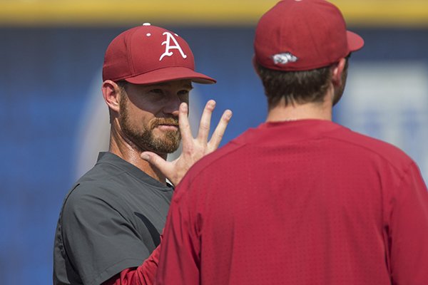 Arkansas pitching coach Matt Hobbs talks to pitchers prior to an SEC Tournament game against Georgia on Thursday, May 23, 2019, in Hoover, Ala.