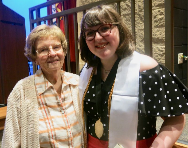 Westside Eagle Observer/SUSAN HOLLAND Amy Whiteside shares a smile with her grandmother, Juanita Whiteside, following the Scholarship Night ceremony Tuesday, May 14, at the Gravette High School Performing Arts Center. Amy, a distinguished high honors student, was awarded a total of $542,900 in scholarships.