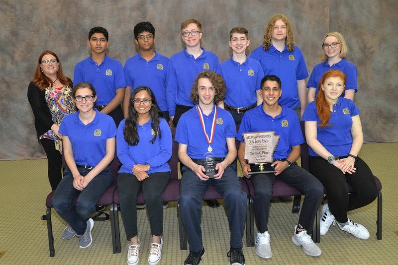 Courtesy photo Haas Hall Academy Bentonville placed second in the 2A conference finals of the Arkansas Governor's Academic Competition "Quiz Bowl 2019" April 27 against Haas Hall Academy Fayetteville. The team includes Sophie Yarbrough (from front left), Nikita Venugopal, D.J. Quezada, Rayahn Sharif and Claire Fraser; coach Amy Russell (from back), Harsha Nannapaneni, Pranav Polavarapu, Adam Rockwood, Kenton Roberts, Duncan Wilkie and Kate Webb. Finals were held at the Arkansas Educational Television Network in Conway.