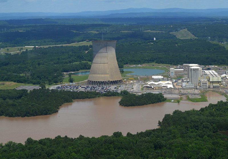 FILE — Floodwaters flow near the Arkansas Nuclear One power plant on Lake Dardanelle outside Russellville in this May 30, 2019 file photo.