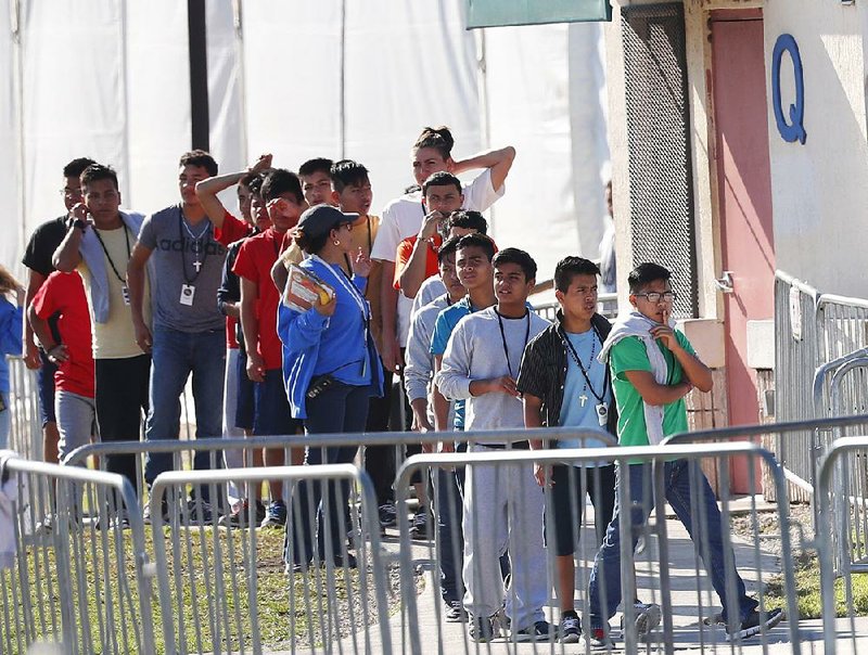 The shelter in Homestead, Fla., houses 2,200 migrant children and is expanding to add hundreds of beds. 