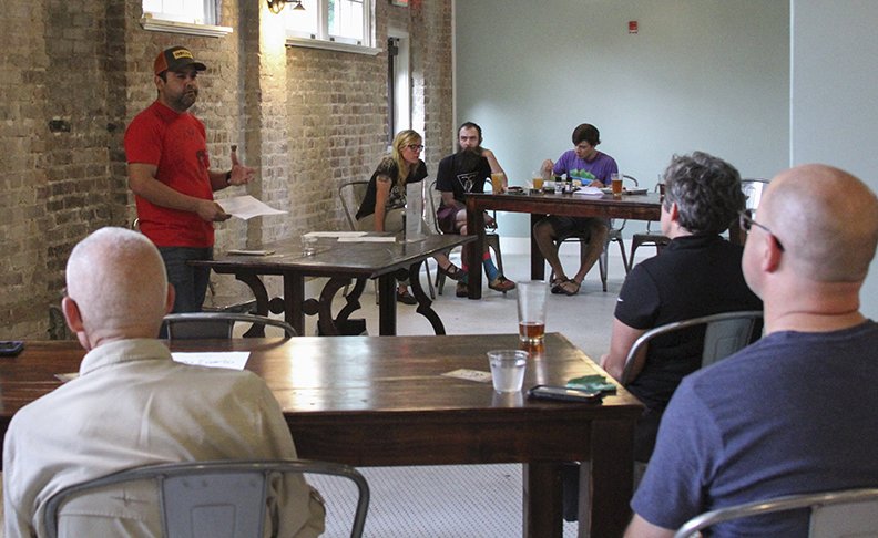 The Sentinel-Record/Jami Smith - TACO chair Bucky Monreal speaks at the first TACO meeting at Superior Bathhouse Brewery on May 28.