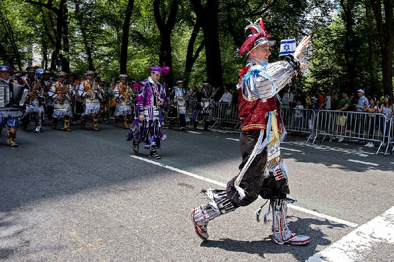 Participants with the Quaker City String Band of Philadelphia march in the Celebrate Israel Parade on Sunday in New York. 