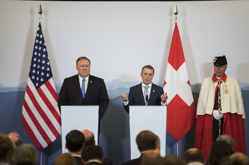 Secretary of State Mike Pompeo (left), speaking Sunday at a news conference with Swiss Foreign Minister Ignazio Cassis in Bellinzona, Switzerland, said the U.S. will continue its effort “to fundamentally reverse the malign activity” of Iran. 