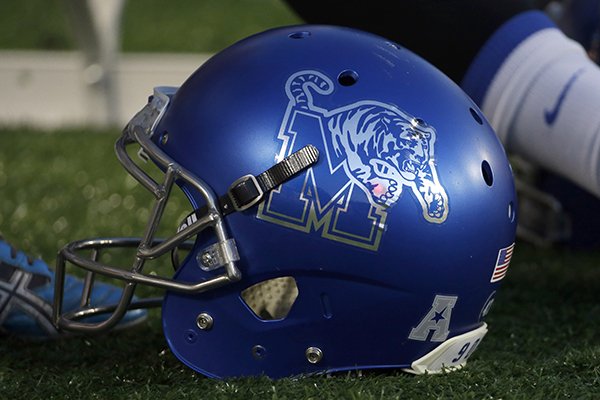 A Memphis helmet sits on the ground before an NCAA college football game against Houston Saturday, Nov. 14, 2015, in Houston. (AP Photo/David J. Phillip)


