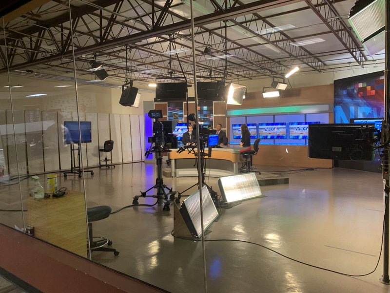 Anchors sit in a studio in Little Rock-based INN, which was purchased Saturday by Waypoint Media and will be renamed to NewsHub. 