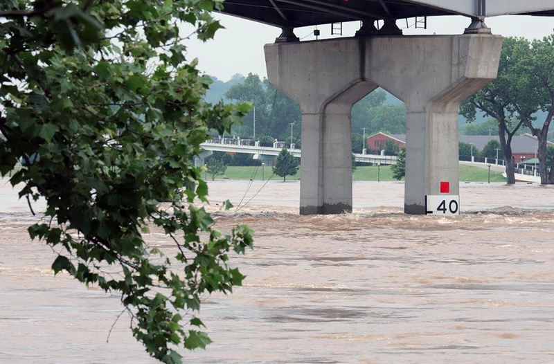 FILE — The Arkansas River flows under the Main Street bridge between Little Rock and North Little Rock on Monday.