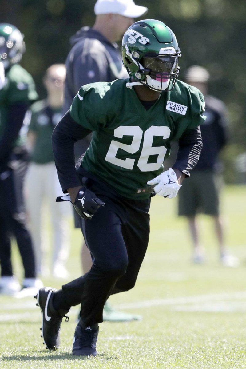 New York Jets running back Le’Veon Bell takes part in a drill during the team’s first day of minicamp Tuesday in Florham Park, N.J. 