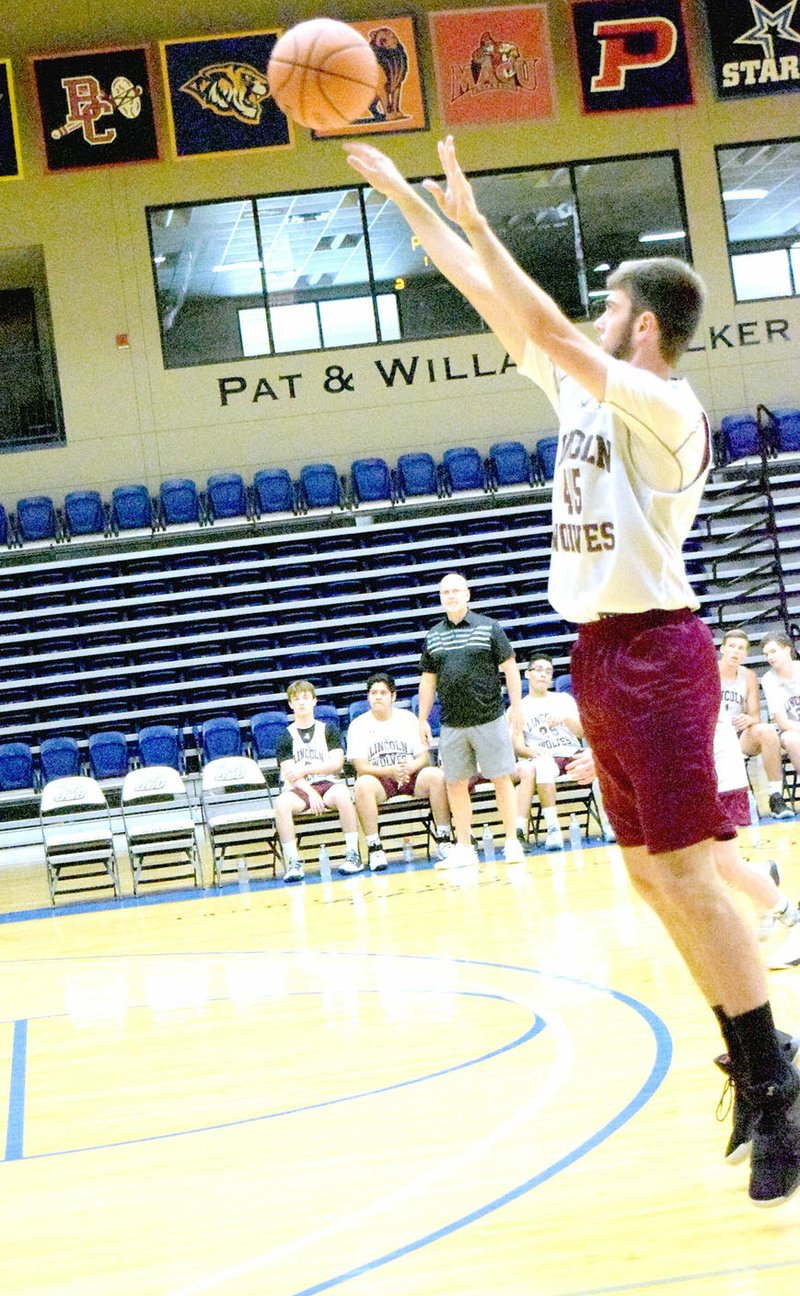 Mike Eckels Special to the Enterprise-Leader/Lincoln rising senior Cole Griscom takes a jump-shot during a scrimmage against Ozark Catholic Friday during the John Brown University summer basketball camp at Siloam Springs. The teams played two 16 minute halves with a running clock. Instead of two shot fouls, each player had a chance to shot one free throw for two points. Lincoln lead by three at the first half 21-18 then jumped ahead to win 50-34 over Ozark Catholic from Tontitown. Lincoln played four other games during the camp. story.lead_photo.caption