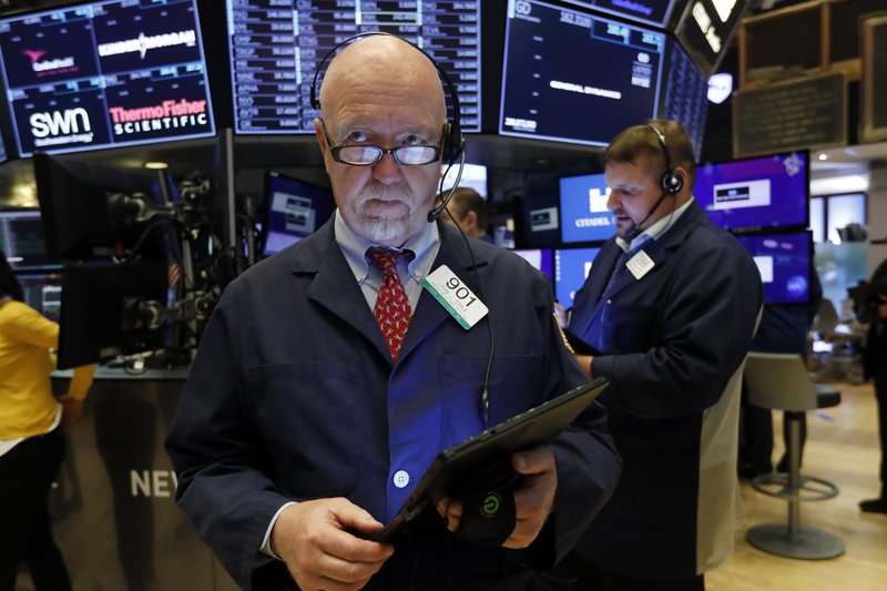 In this May 30, 2019, file photo trader John Doyle works on the floor of the New York Stock Exchange. U.S. stocks headed broadly higher in early trading Tuesday, June 4, on Wall Street after comments from Mexico's foreign minister injected some optimism into a developing trade dispute. (AP Photo/Richard Drew, File)