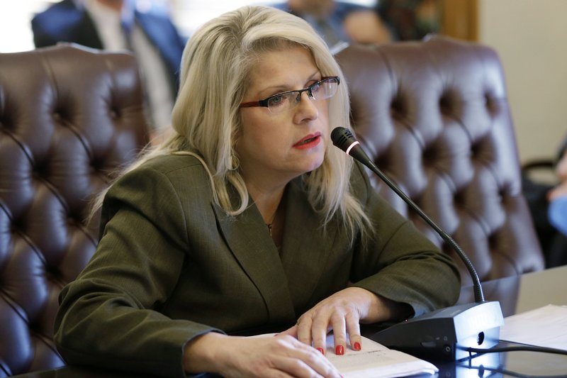 FILE - In this Jan. 28, 2015 file photo, Sen. Linda Collins-Smith, R-Pocahontas, speaks at the Arkansas state Capitol in Little Rock, Ark. Authorities in Arkansas say they're investigating as a homicide remains found outside the home of the former state senator who Republican Party officials say is dead. An Arkansas State Police spokesman said Wednesday, June 5, 2019, that the remains were found Tuesday outside the home in Pocahontas. Police declined to identify the victim. Property records show the home belongs to Collins-Smith and her ex-husband. (AP Photo/Danny Johnston, File)

