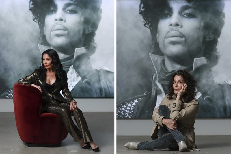In this photo combination, singers Apollonia Kotero, left, and Susannah Melvoin pose in front of a photo of Prince at Warner Music Group in Los Angeles on Friday, May 31, 2019. Kotero and Melvoin are among several artists who spoke with The Associated Press about their experience working with Prince in advance of the release of his posthumous album, &quot;Originals,&quot; due out this month. (Photo by Mark Von Holden/Invision/AP)