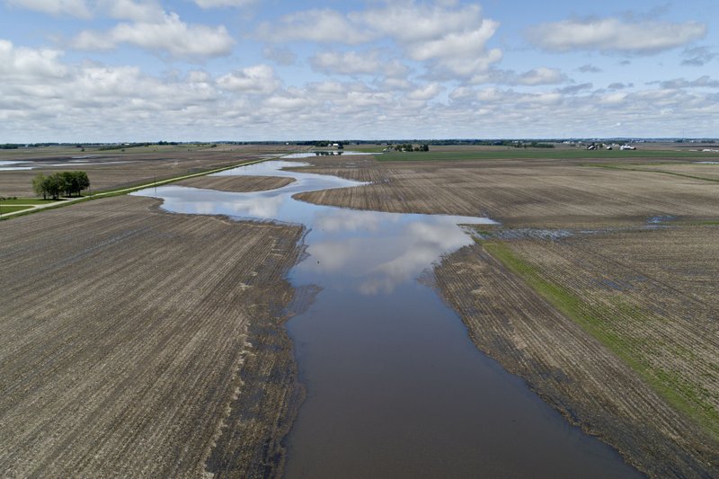 Water is seen flooding farmland in an aerial photograph taken over La Moille, Ill., on May 29, 2019. Bloomberg photo by Daniel Acker.
