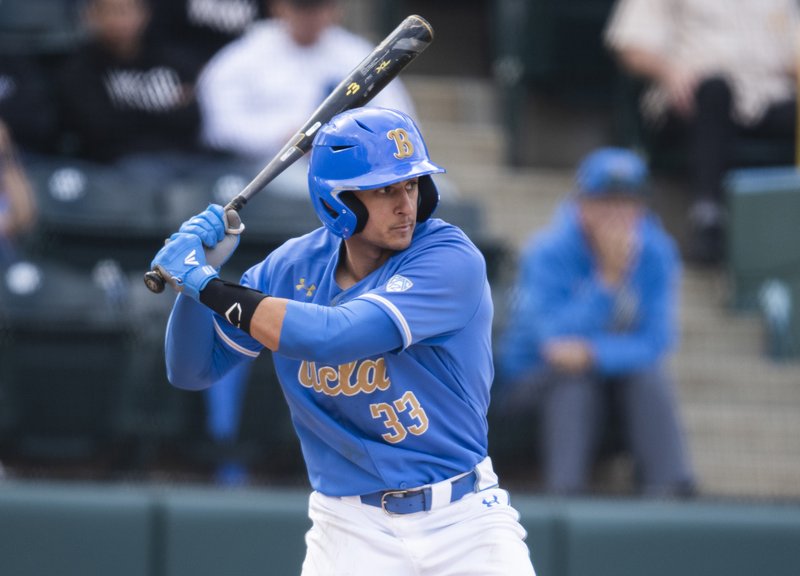 In this March 3, 2019, file photo, UCLA's Chase Strumpf bats during the team's NCAA college baseball game against Sacramento State in Los Angeles. UCLA plays Michigan this week in the NCAA tournament super regionals. Strumpf was one of a program-record 13 players selected during the MLB draft. Strumpf found out he was selected in the second round by the Chicago Cubs after hitting a three-run home run in the Bruins' 6-3 win over Loyola Marymount in the Los Angeles regional final. (AP Photo/Kyusung Gong, File)