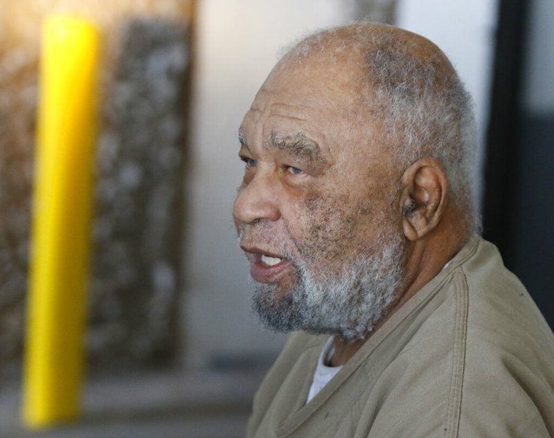 FILE - In this Monday, Nov. 26, 2018 file photo, Samuel Little, who often went by the name Samuel McDowell, leaves the Ector County Courthouse after attending a pre-trial hearing in Odessa, Texas.  (Mark Rogers/Odessa American via AP, File)