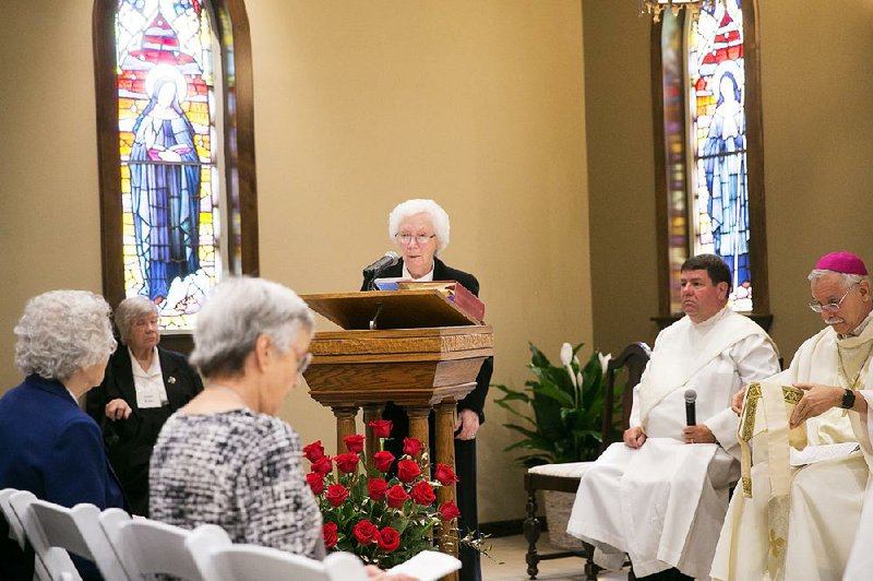 Sister Maria DeAngeli, prioress of St. Scholastica, speaks during the dedication of the new monastery in October. DeAngeli, who has led the monastery for the past 10 years, will step down as prioress today in a closed ceremony at the monastery, one of many changes in the life of the order in recent years. 