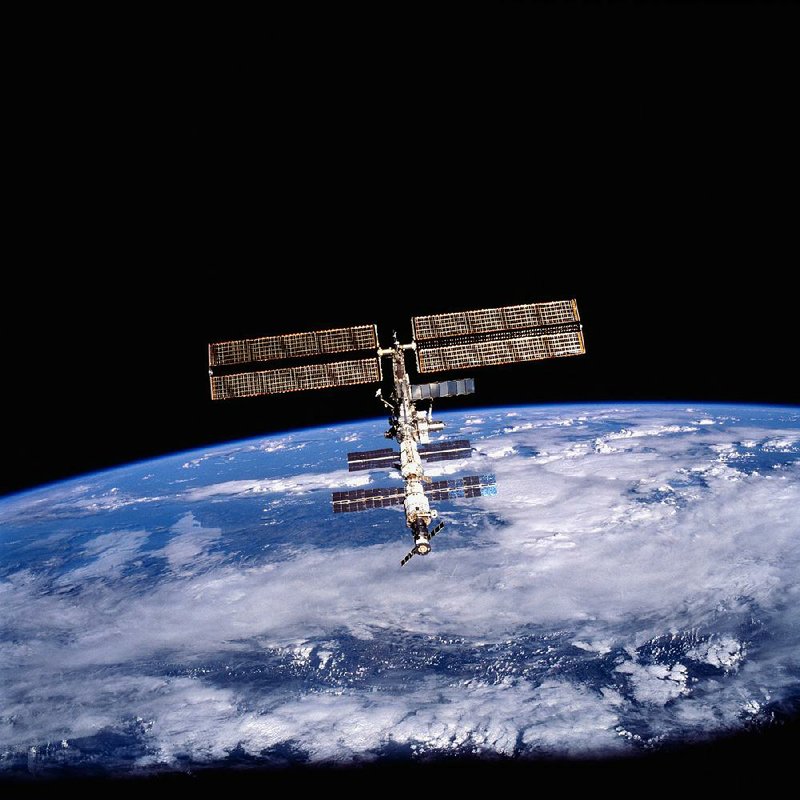 Under a plan announced Friday by NASA, the International Space Station will open its hatches to private astronauts, including tourists and business-minded travelers. 