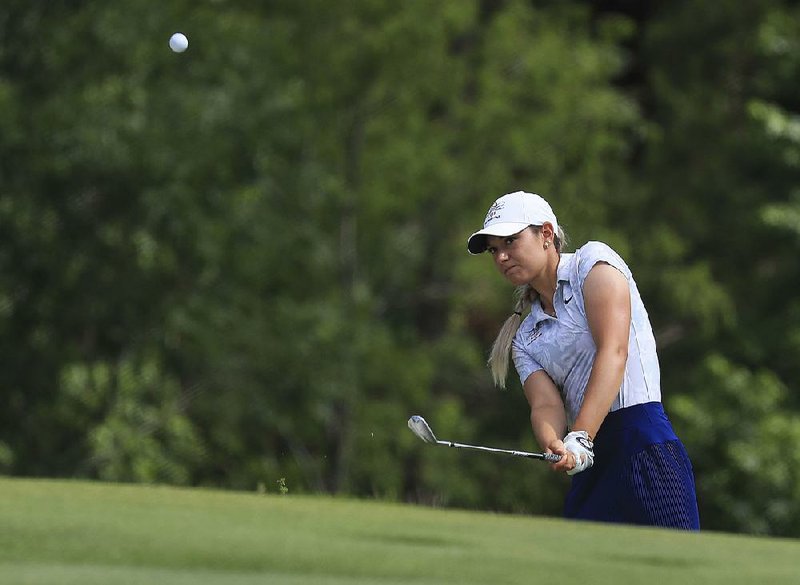 Ana Belac teamed up with Luis Gagne to defeat Quade Cummins and Ann Parmerter on Friday at the Arnold Palmer Cup at the Alotian Club in Roland. Belac, a member of the International team, is from Slovenia — one of 18 countries represented during the weekend.