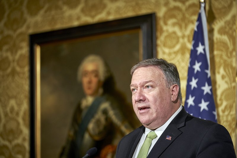 U.S. Secretary of State Mike Pompeo and Dutch Foreign Minister Stef Blok talk to reporters after a meeting in The Hague, Netherlands, Monday, June 3, 2019. (AP Photo/Phil Nijhuis)