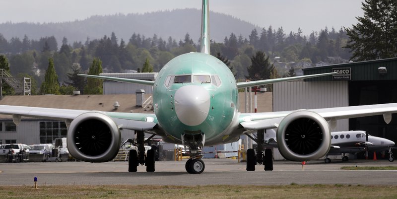 FILE - In this may 8, 2019 photo, a Boeing 737 MAX 8, being built for American Airlines, makes a turn on the runway as it's readied for takeoff on a test flight in Renton, Wash. Two key lawmakers said Friday, June 7, 2019, that Boeing planned to delay fixing a nonworking safety alert on its 737 Max aircraft for three years and sped up the process only after the first of two deadly crashes involving Max planes last October. U.S. Reps. Peter DeFazio of Oregon and Rick Larsen of Washington disclosed the decision in letters sent to Boeing and the Federal Aviation Administration seeking details on what the plane maker and the agency knew and when, and at what point airlines were told of the defect.  (AP Photo/Elaine Thompson)