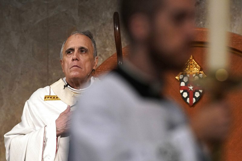 Cardinal Daniel DiNardo presides over a Mass of Ordination for candidates for the priesthood at the Co-Cathedral of the Sacred Heart in Houston Saturday, June 1, 2019. DiNardo, leading the U.S. Catholic Church's sex abuse response, has been accused of mishandling a case where his deputy allegedly manipulated a woman into a sexual relationship, even as he counselled her husband and solicited their donations. The Galveston-Houston archdiocese acknowledged a sexual relationship between Monsignor Frank Rossi and parishioner Laura Pontikes, but asserted that it was consensual. (AP Photo/David J. Phillip)