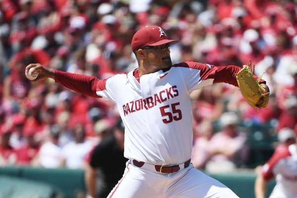 Arkansas' Isaiah Campbell throws against Mississippi during the second inning of Game 1 at the NCAA college baseball super regional tournament Saturday, June 8, 2019, 2019, in Fayetteville, Ark. (AP Photo/Michael Woods)