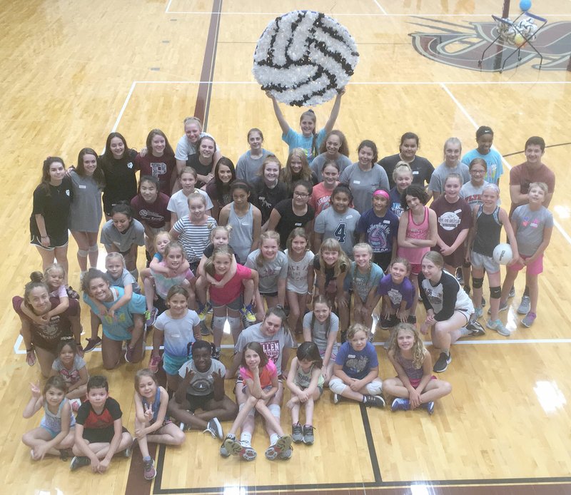 Photo submitted A total of 38 campers attended the first day of Little Lady Panther Volleyball Camp hosted by the Siloam Springs High School volleyball program. The campers posed for a photo with the SSHS players during the first day. The final day of Little Lady Panther Camp is set from 1 to 4 p.m. Tuesday at the Panther Activity Center in Siloam Springs High School. Cost is $25. For more information, contact coach Joellen Wright at the high school at 524-5134.