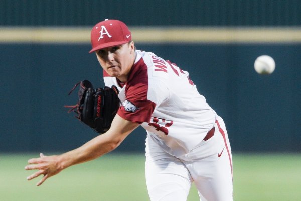 Arkansas Razorbacks Patrick Wicklander (33) throws a pitch during the NCAA Division I Baseball Championship Regionals, Sunday, June 2, 2019 at Baum-Walker Stadium in Fayetteville.