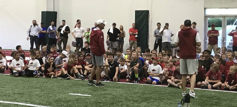 Arkansas Coach Chad Morris addresses more than 240 at Monday's Youth Camp.