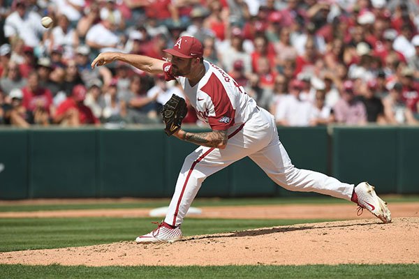 Arkansas pitcher Cody Scroggins throws during Game 3 of the NCAA Fayetteville Super Regional at Baum-Walker Stadium on Monday, June 10, 2019, in Fayetteville.