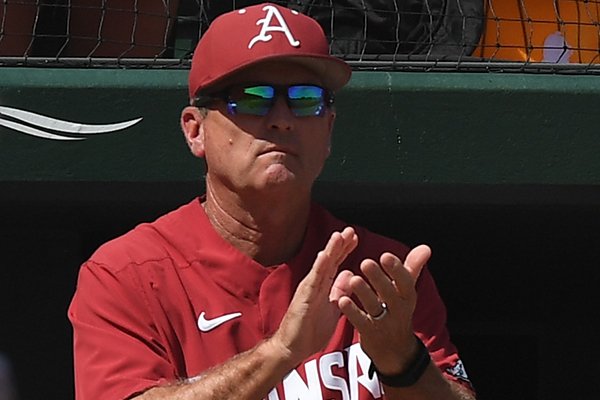 Arkansas coach Dave Van Horn applauds during Game 3 of the NCAA Fayetteville Super Regional at Baum-Walker Stadium on Monday, June 10, 2019, in Fayetteville. 