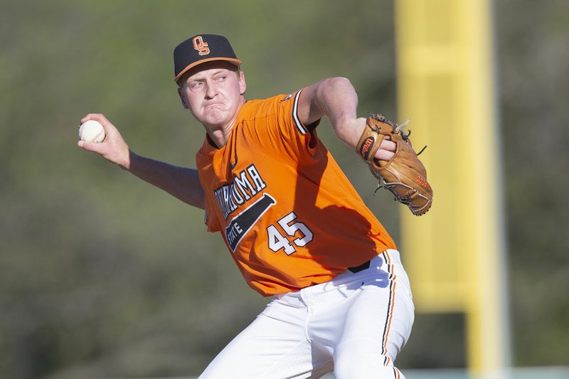 Bruce Waterfield/OSU Athletics Oklahoma State junior Logan Gragg, shown pitching against the Texas Longhorns during an NCAA Division I baseball game, Saturday, April 20, 2019, at Allie P. Reynolds Stadium in Stillwater, Okla., has been drafted in the 8th round by the St. Louis Cardinals. Gragg, son of Scott and Shawna Gragg, majored in livestock merchandise while attending college.