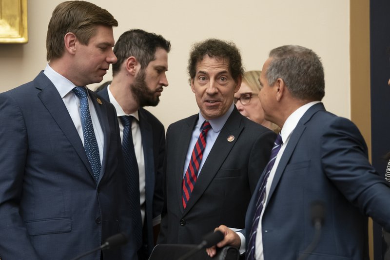 House Judiciary Committee members Rep. Eric Swalwell, D-Calif., far left, Rep. Jamie Raskin, D-Md., center, and Rep. David Cicilline, D-R.I., far right, are shown talking on Capitol Hill in Washington, Monday, June 10, 2019.