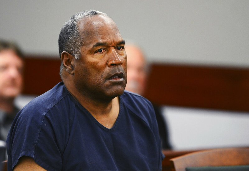 In this May 14, 2013, file photo, O.J. Simpson appears at an evidentiary hearing in Clark County District Court in Las Vegas. In a letter that surfaced after her 1994 death, Nicole Brown Simpson detailed the fear and violence that framed her marriage to O.J. Simpson. In the 25 years since then, spousal abuse has moved from a private matter to a public health concern. (Ethan Miller via AP, Pool, File) story.lead_photo.caption