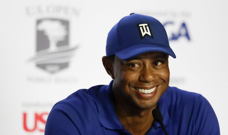 Tiger Woods speaks to the media at a news conference at the U.S. Open Championship golf tournament Tuesday, June 11, 2019, in Pebble Beach, Calif. 