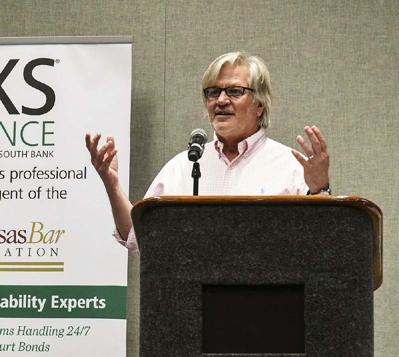 Attorney David Couch of Little Rock speaks at the annual Arkansas Bar Association meeting about medical marijuana at the Hot Springs Convention Center on Wednesday.